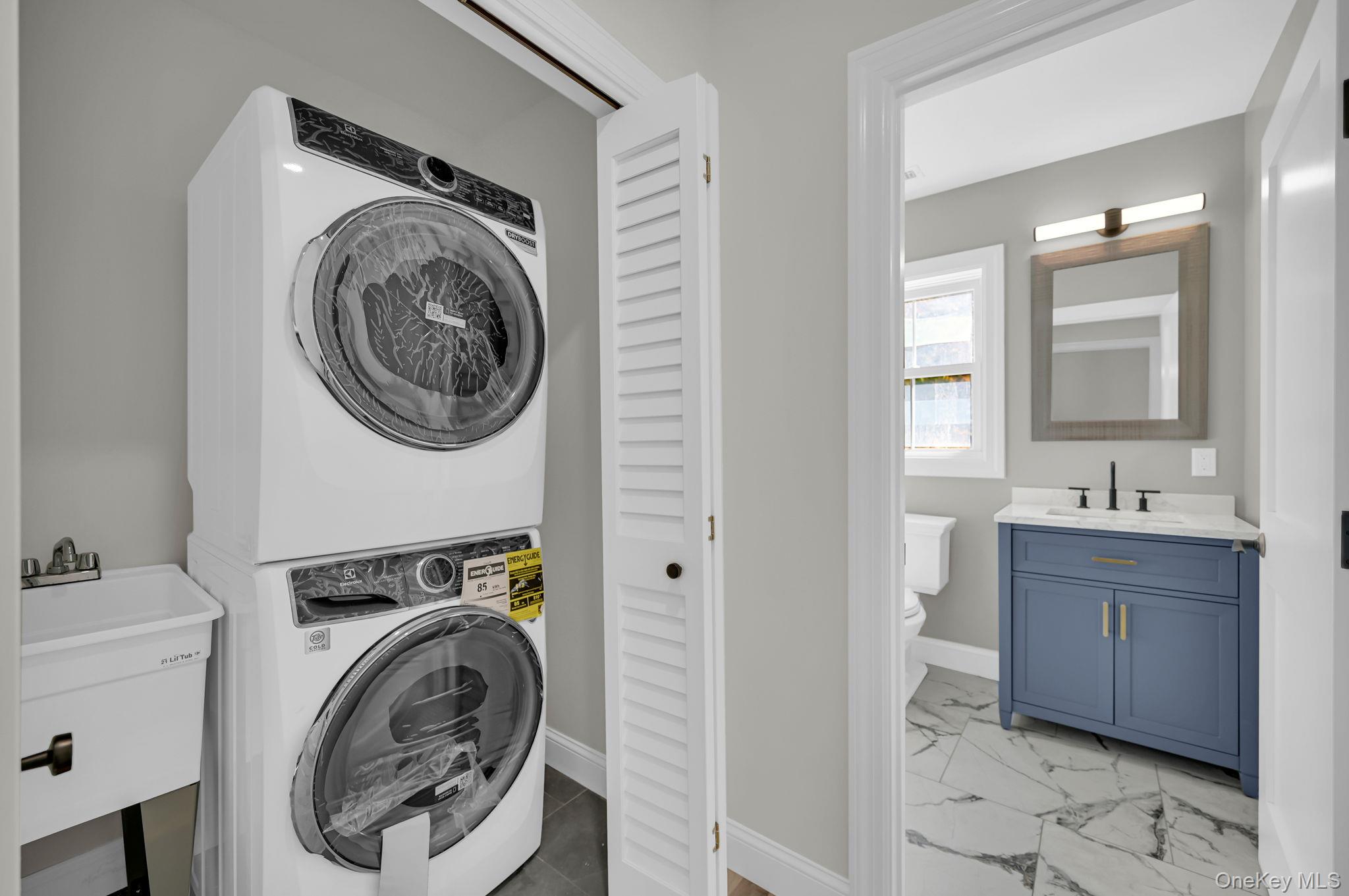 170 Brimstone Road Patterson, NY 12563 - Photo 17 of 48 Laundry room featuring stacked washer and clothes dryer in 2nd floor hallway