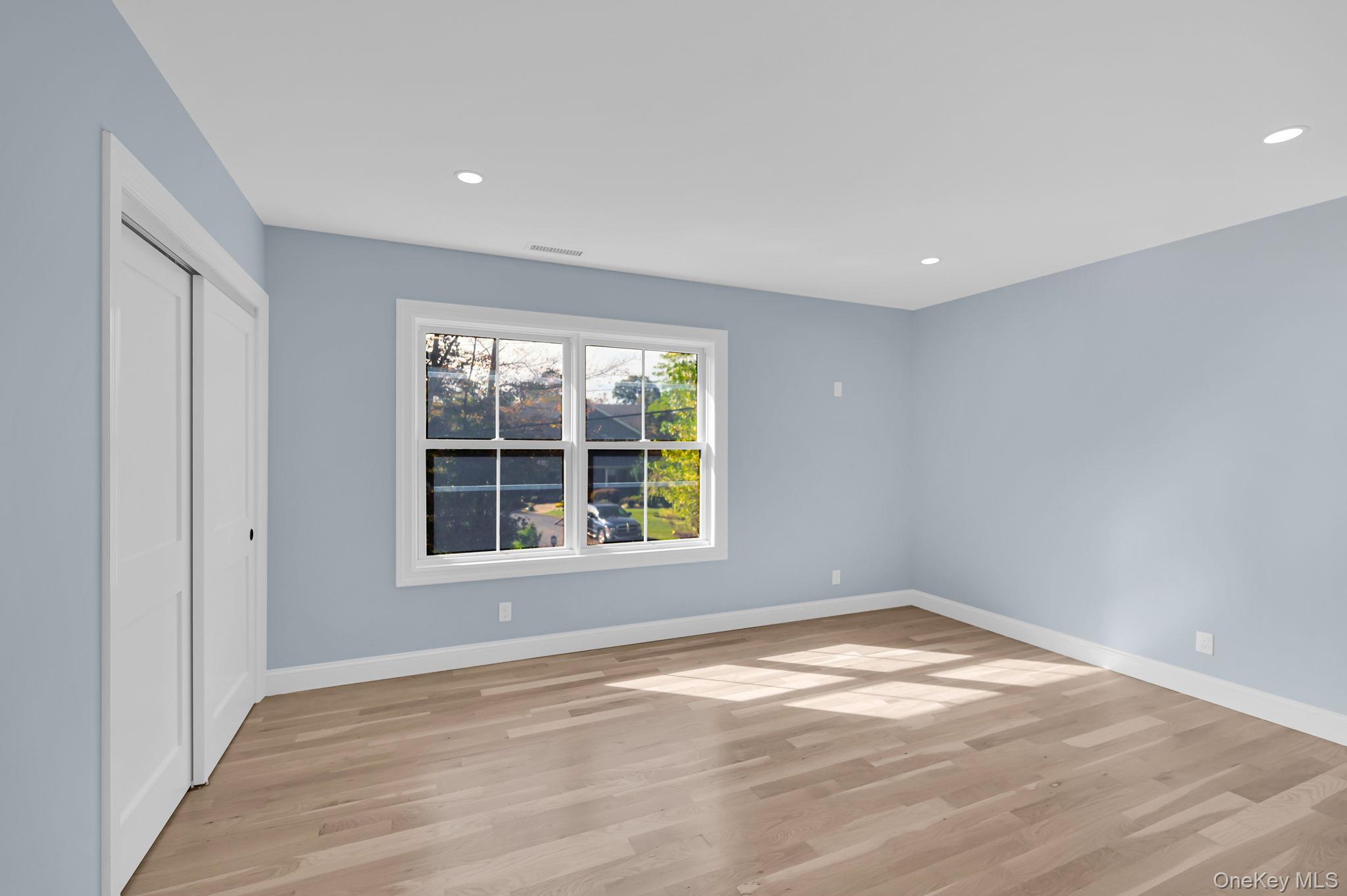 170 Brimstone Road Patterson, NY 12563 - Photo 21 of 48 2nd fl - bedroom2 featuring light wood finished floors, recessed lighting, and a closet