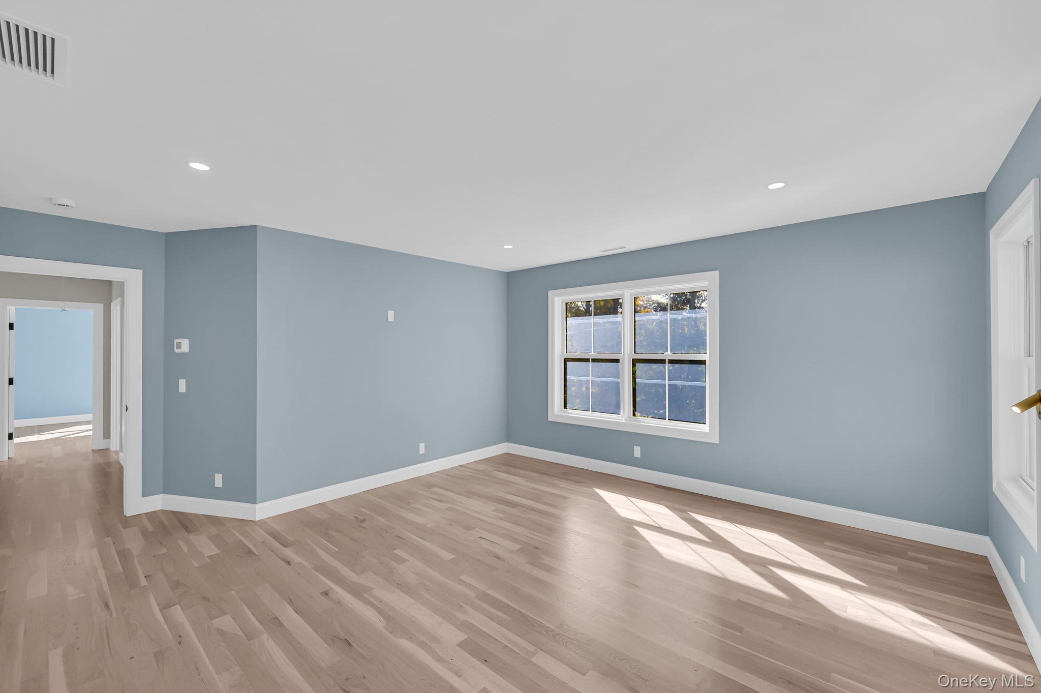 170 Brimstone Road Patterson, NY 12563 - Photo 25 of 48 Empty room featuring light wood-style flooring and recessed lighting