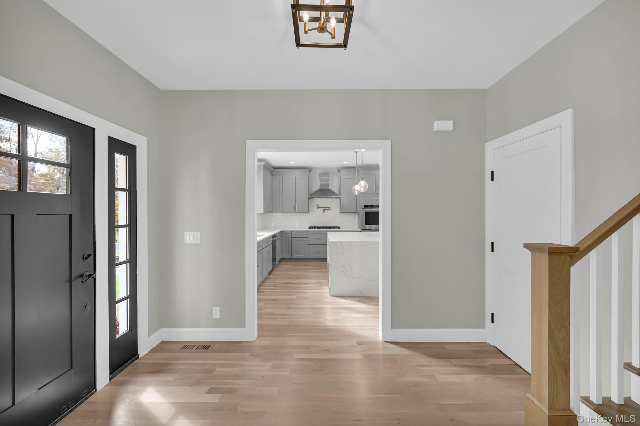 170 Brimstone Road Patterson, NY 12563 - Photo 3 of 48 Entryway with light wood-style floors and stairs