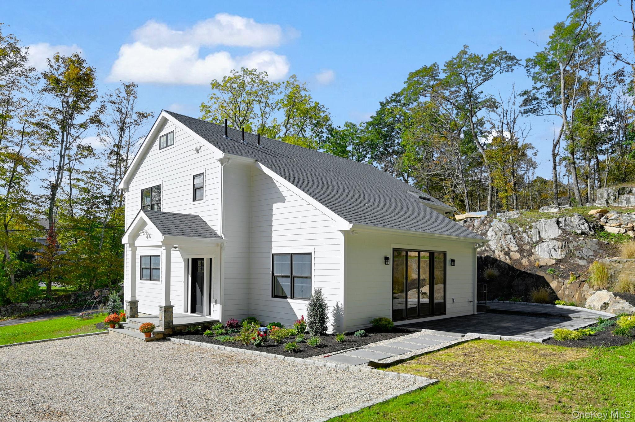 170 Brimstone Road Patterson, NY 12563 - Photo 42 of 48 Modern inspired Colonial featuring a shingled roof.