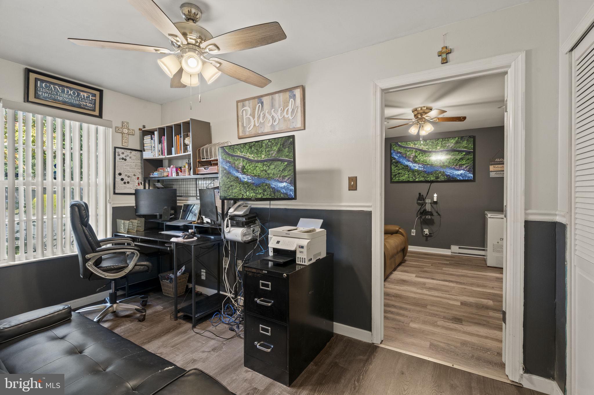 205 Franklin Avenue Berlin, NJ 08009 - Photo 14 of 36 a view of a workspace with furniture and a window
