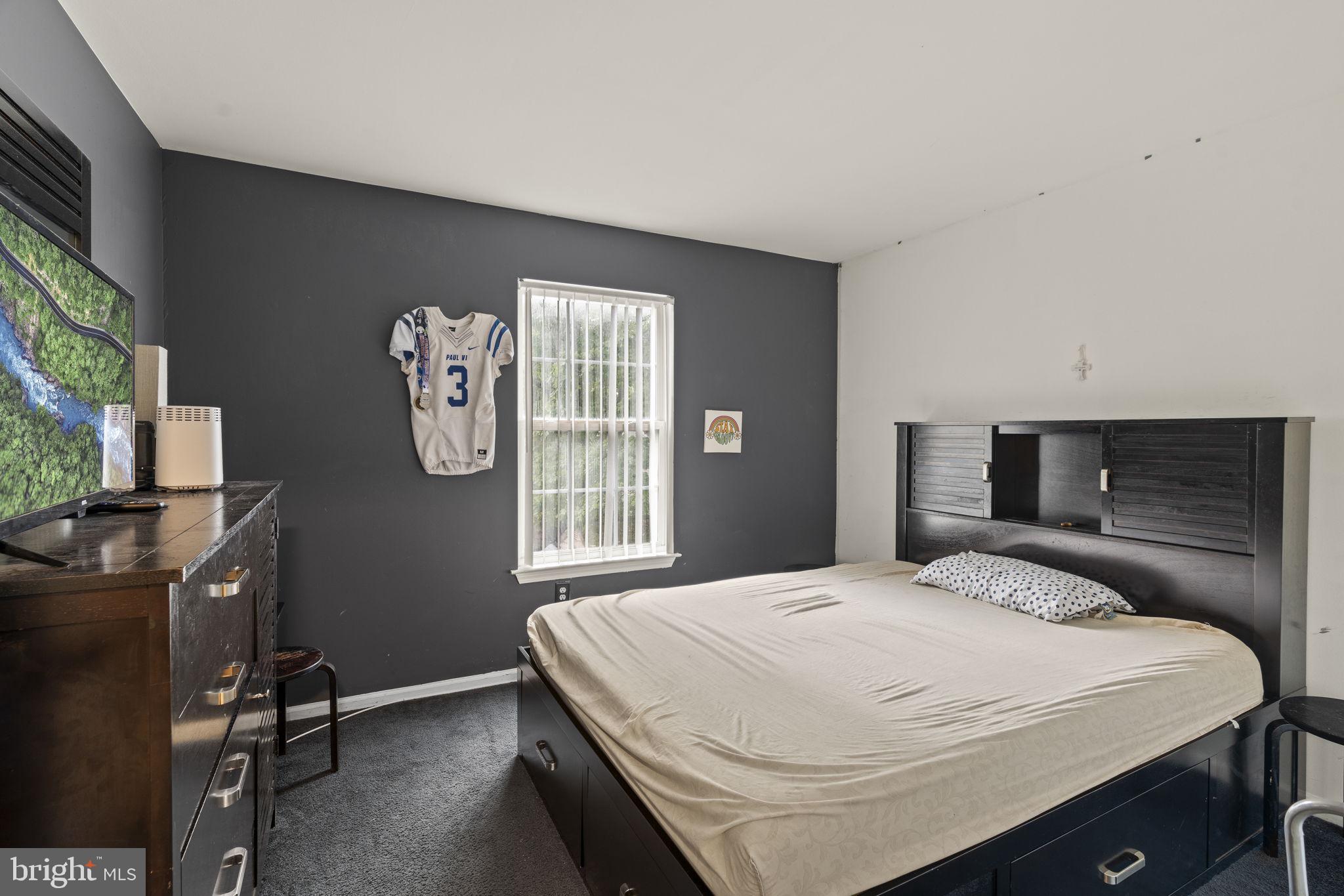 205 Franklin Avenue Berlin, NJ 08009 - Photo 21 of 36 a bedroom with a bed and a window
