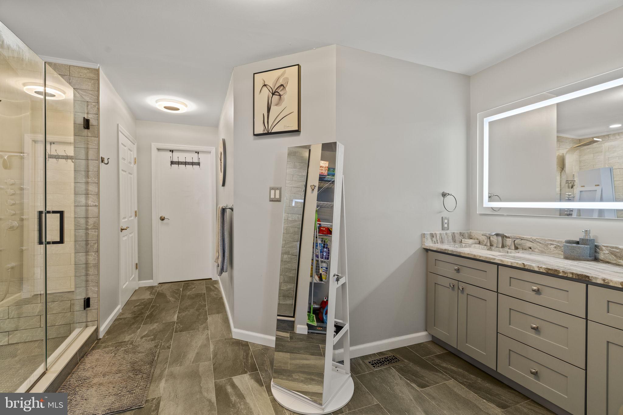 205 Franklin Avenue Berlin, NJ 08009 - Photo 28 of 36 a en suite bathroom with a granite countertop sink and a mirror