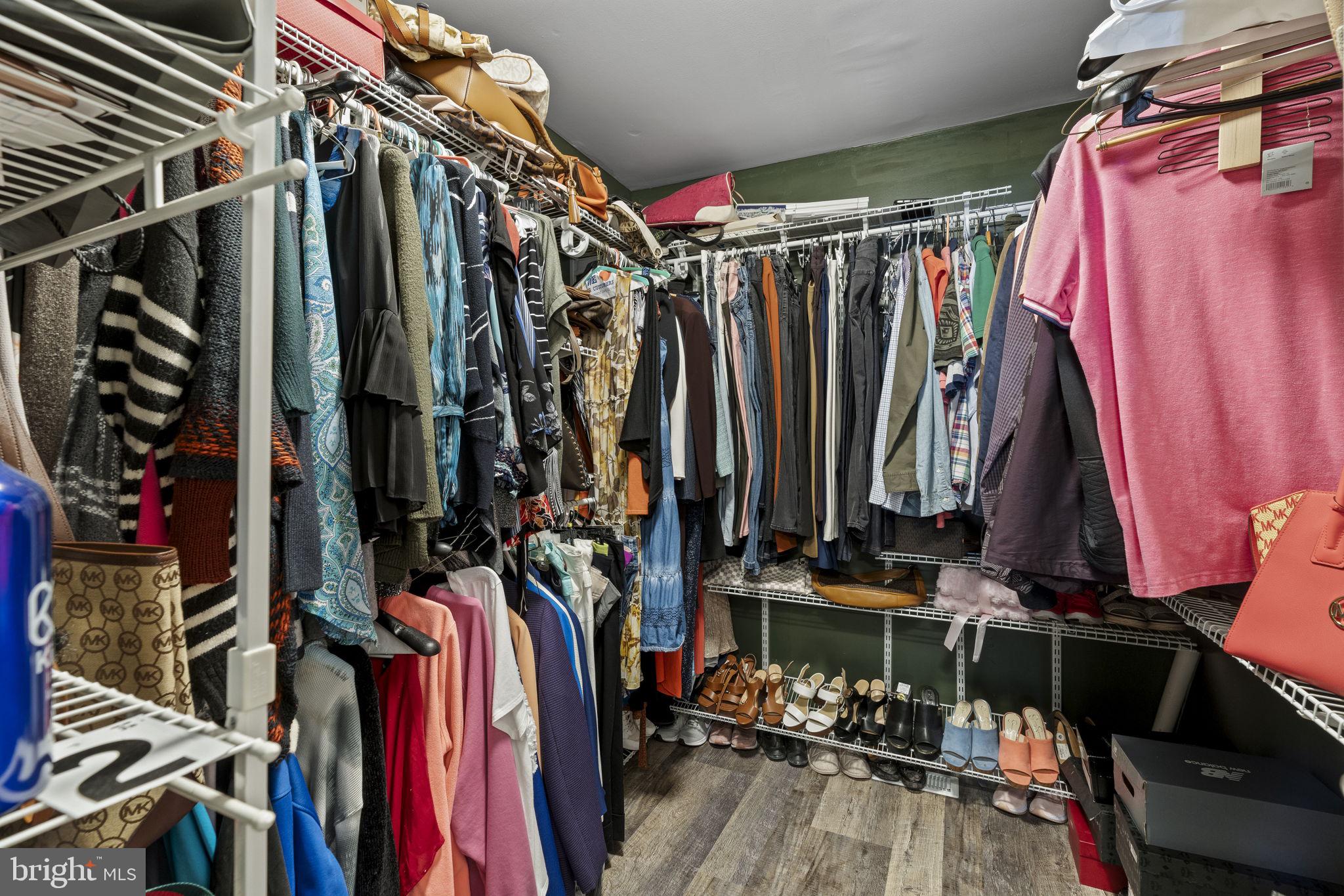 205 Franklin Avenue Berlin, NJ 08009 - Photo 31 of 36 a view of walk in closet with clothes
