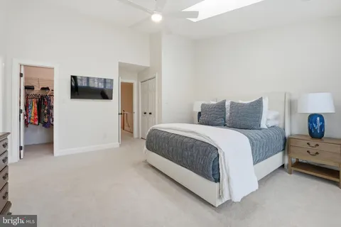 a bed room with furniture and a window