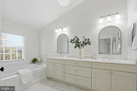 a living room with fireplace furniture and a flat screen tv