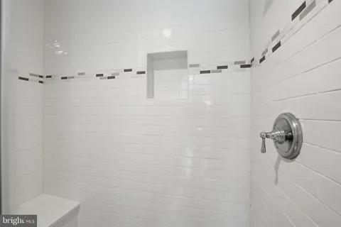 a backyard of a house with outdoor seating