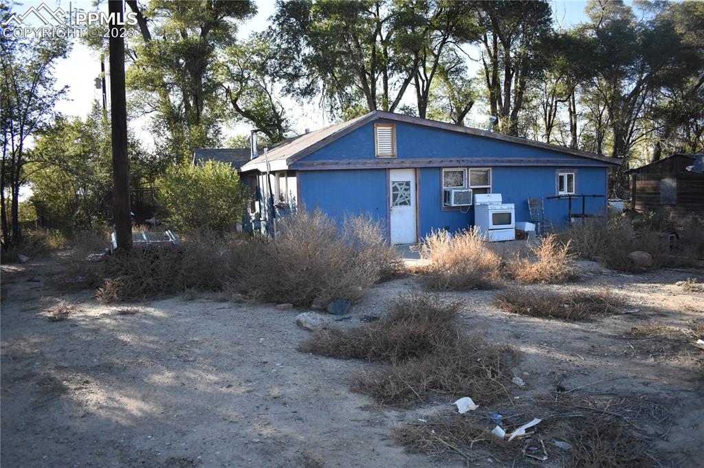 600 West 3rd Street Ordway, CO 81063 - Photo 14 of 25 a view of a small house with a yard