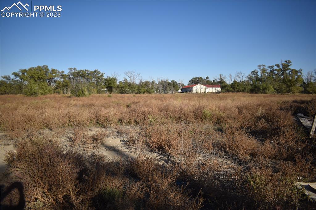 600 West 3rd Street Ordway, CO 81063 - Photo 19 of 25 a view of a field of grass and trees