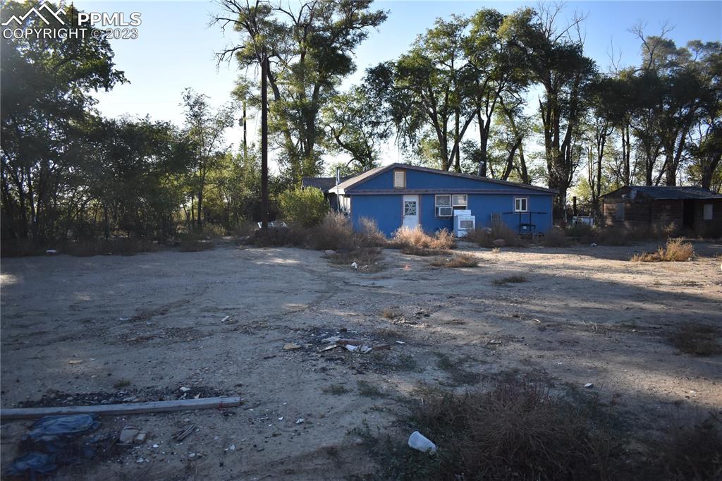 600 West 3rd Street Ordway, CO 81063 - Photo 22 of 25 a view of a yard with large trees