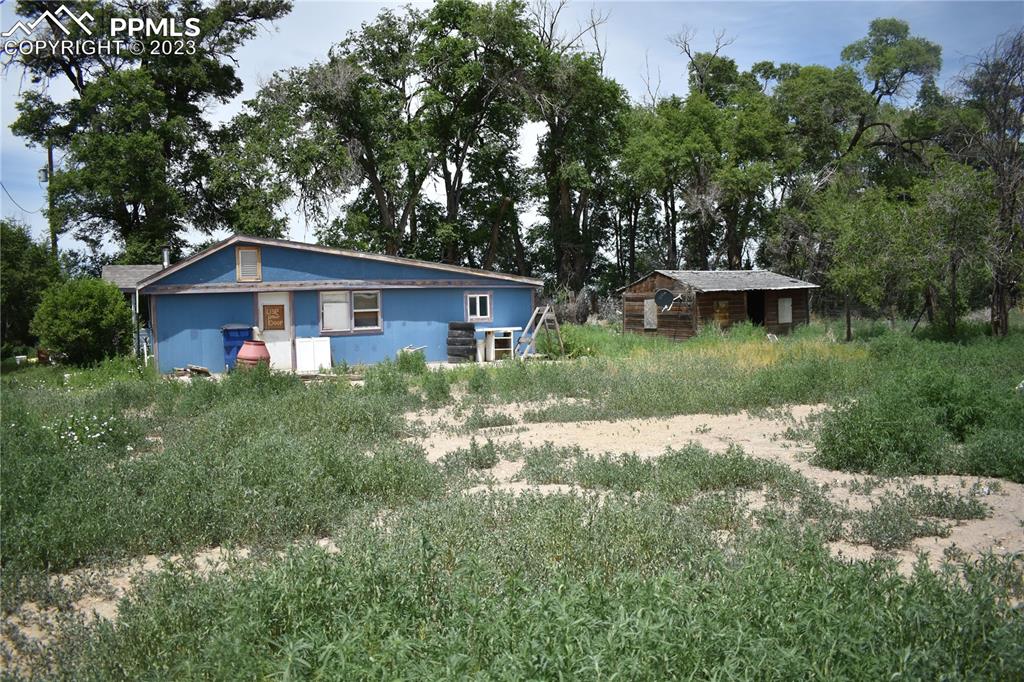 600 West 3rd Street Ordway, CO 81063 - Photo 3 of 25 a view of a house with a yard