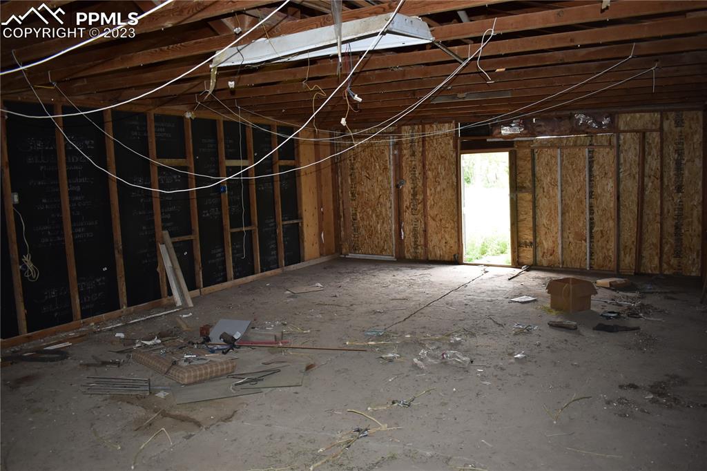 600 West 3rd Street Ordway, CO 81063 - Photo 6 of 25 a view of a room with wooden walls