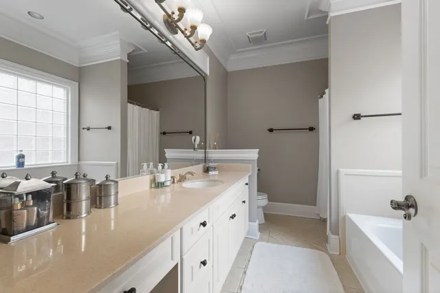 a building outdoor space with patio furniture and potted plants