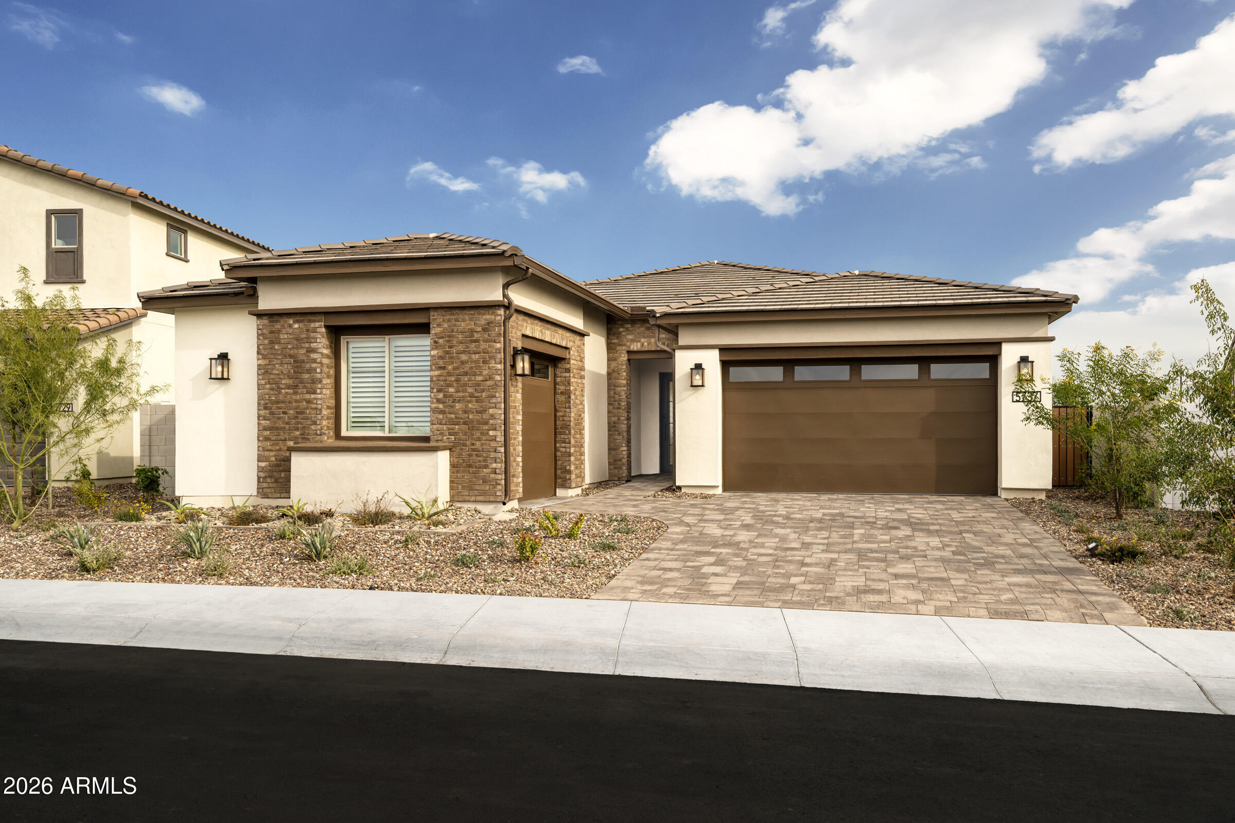 5737 South Quartz Street Gilbert, AZ 85298 - Photo 1 of 15 a front view of a house with a yard