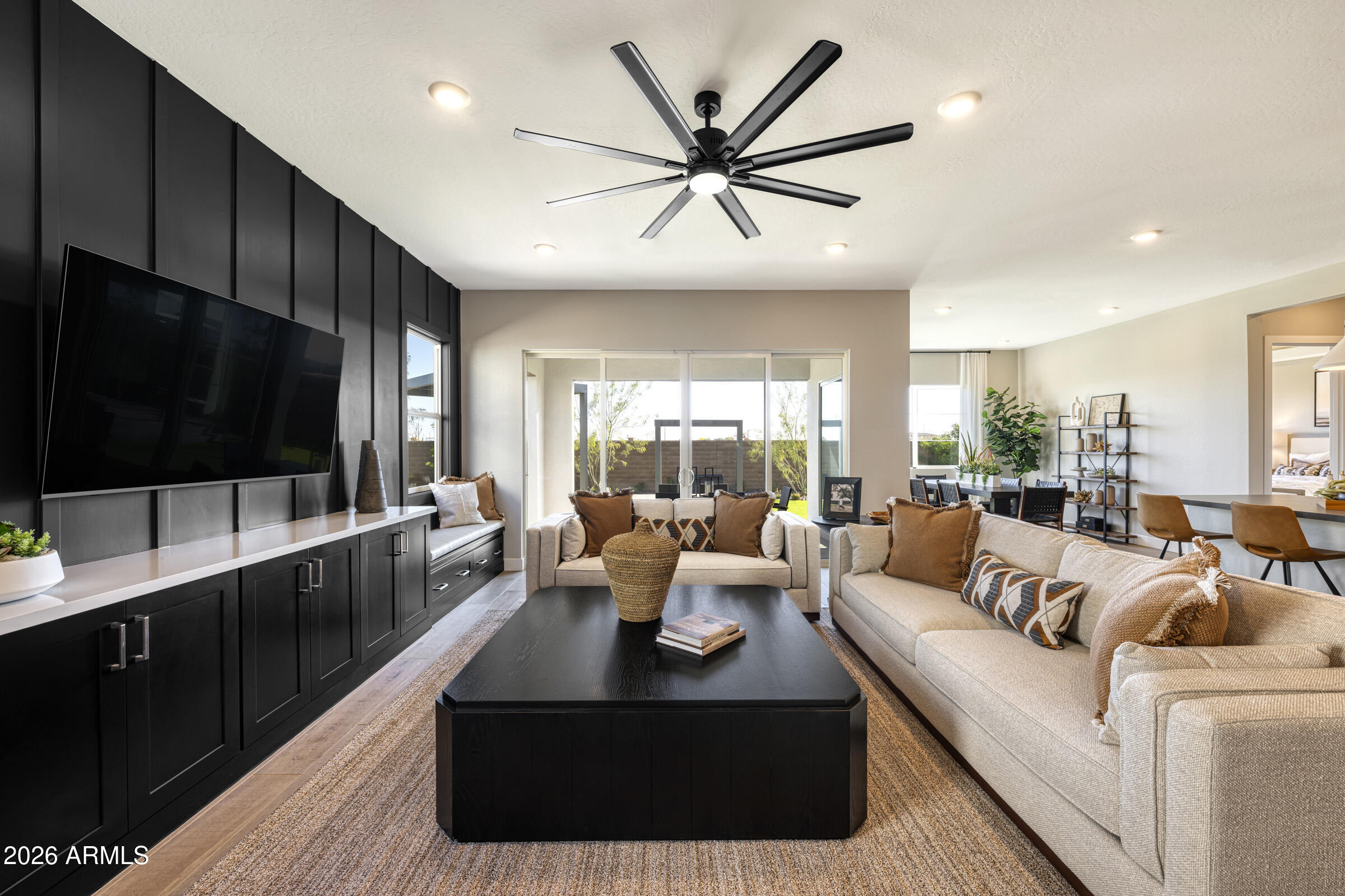 5737 South Quartz Street Gilbert, AZ 85298 - Photo 6 of 15 a living room with furniture and a flat screen tv