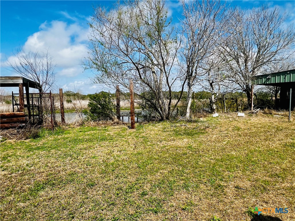 607 Quail Meadow Road Seadrift, TX 77983 - Photo 16 of 48 a view of yard with tree