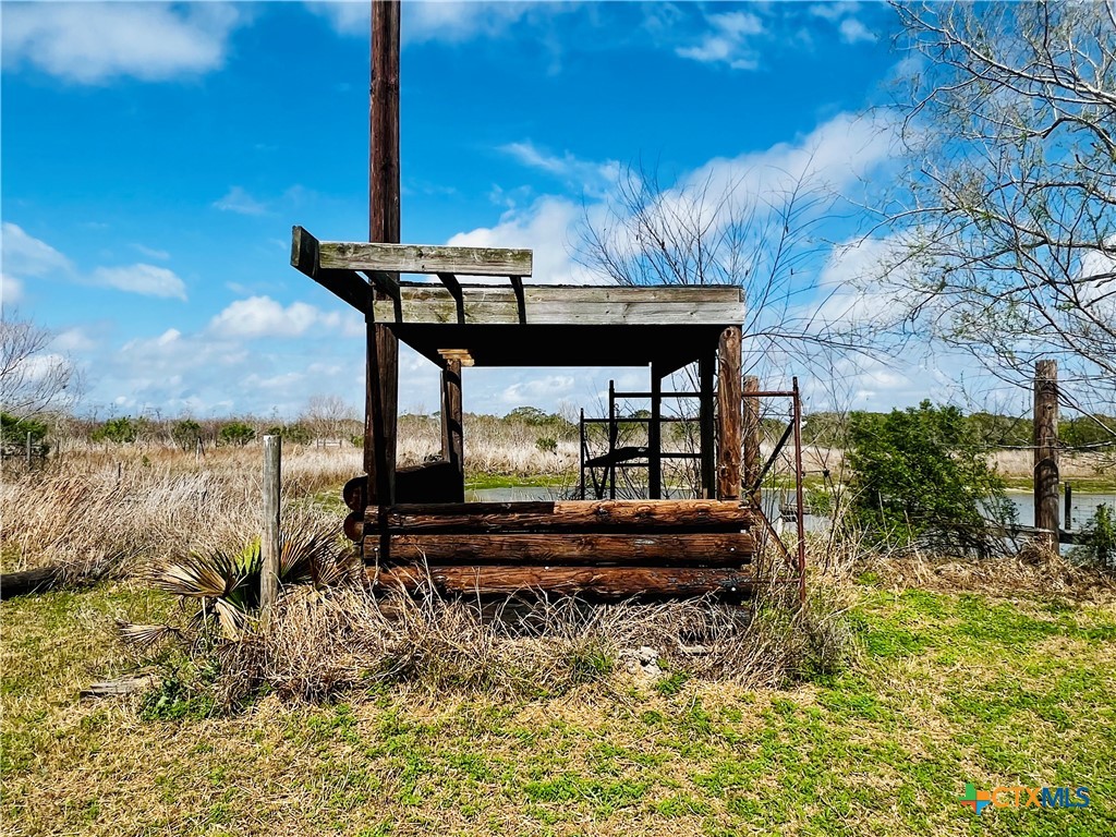 607 Quail Meadow Road Seadrift, TX 77983 - Photo 19 of 48 a front view of a house with a yard