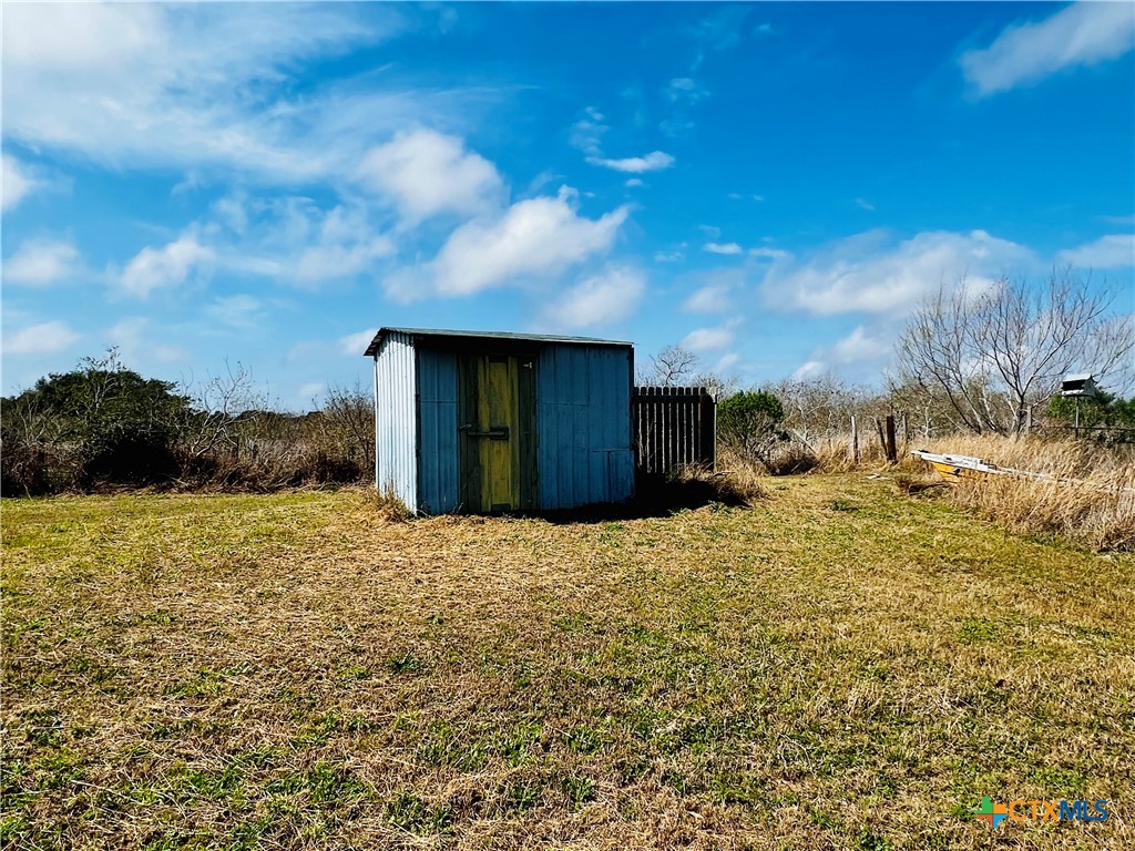 607 Quail Meadow Road Seadrift, TX 77983 - Photo 20 of 48 a house view with a yard