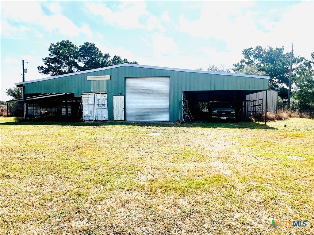 607 Quail Meadow Road Seadrift, TX 77983 - Photo 2 of 48 a view of a house with a patio