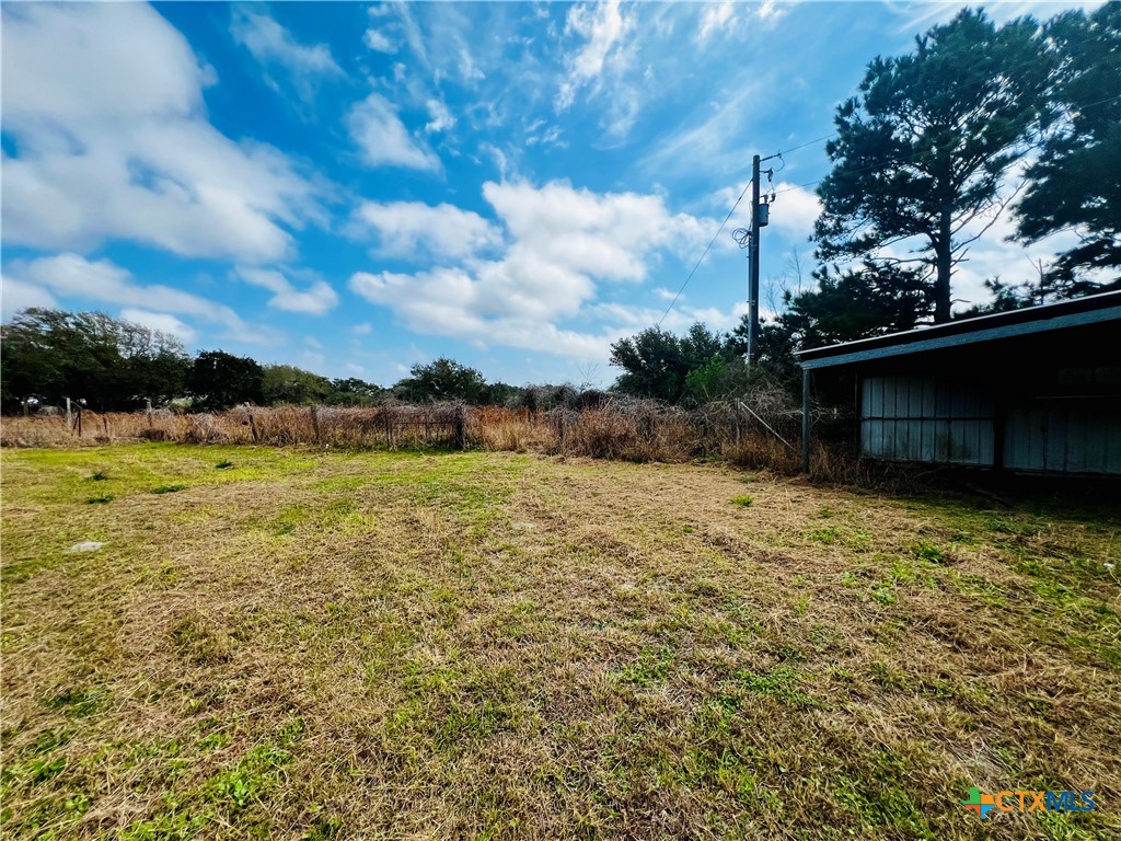 607 Quail Meadow Road Seadrift, TX 77983 - Photo 40 of 48 a view of a garden with an outdoor space