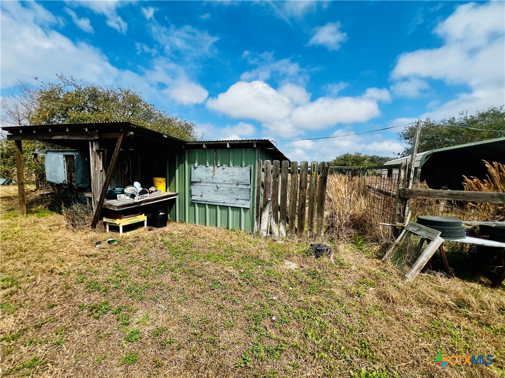 607 Quail Meadow Road Seadrift, TX 77983 - Photo 46 of 48 a view of a chairs and table in the patio