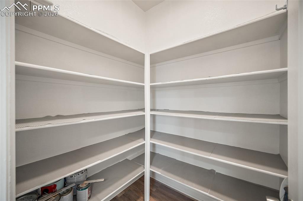 855 Dawn Break Loop Colorado Springs, CO 80910 - Photo 15 of 42 a view of walk in closet with empty racks