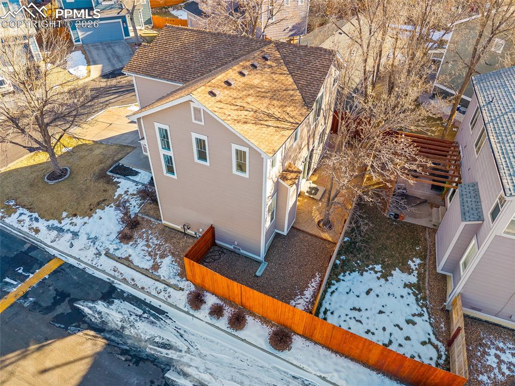 855 Dawn Break Loop Colorado Springs, CO 80910 - Photo 33 of 42 a view of a house with a snow