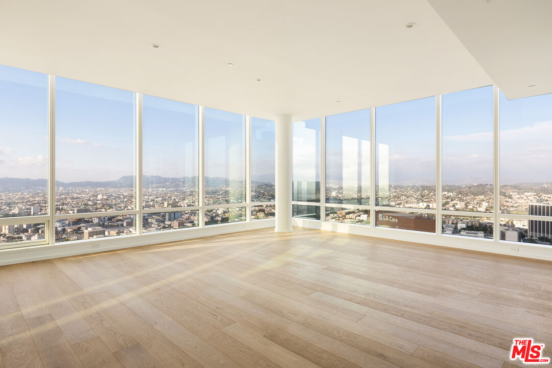 1000 West 8th Street, Unit PH5803 Los Angeles, CA 90017 - Photo 15 of 57 a view of an ocean with a floor to ceiling window