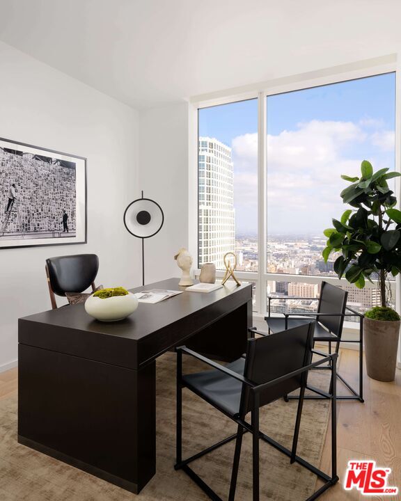 1000 West 8th Street, Unit PH5803 Los Angeles, CA 90017 - Photo 4 of 57 a view of a workspace with a table and chair