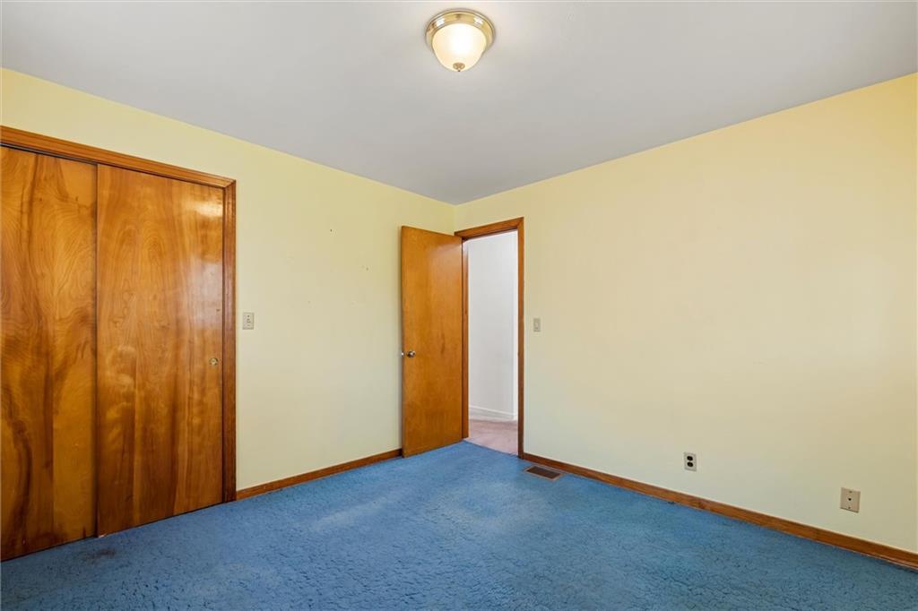 8324 Lamor Road Mercer, PA 16137 - Photo 14 of 30 a view of an empty room with a window