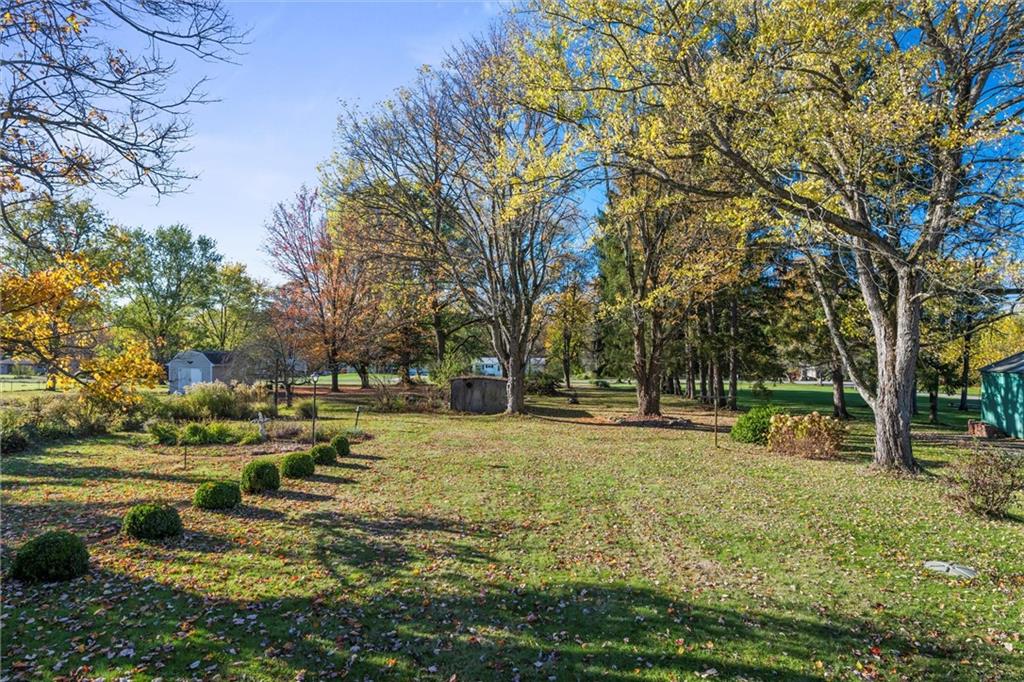 8324 Lamor Road Mercer, PA 16137 - Photo 2 of 30 a view of a yard with swimming pool