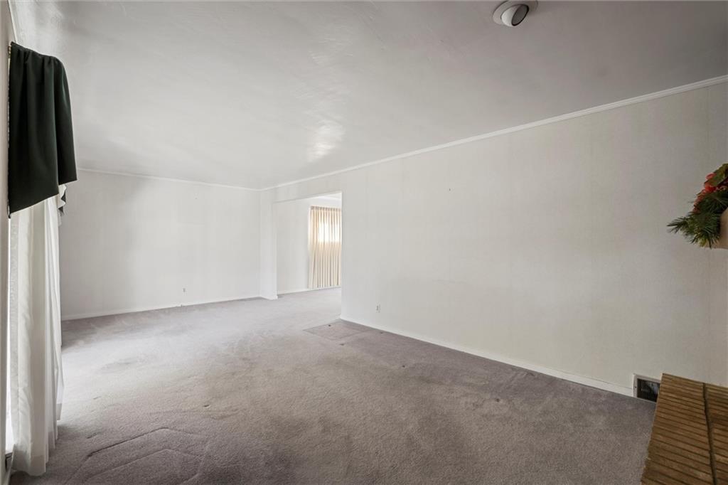 8324 Lamor Road Mercer, PA 16137 - Photo 4 of 30 an empty room with windows