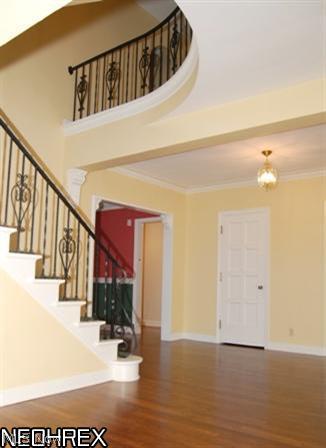 657 Ridgecrest Road Akron, OH 44303 - Photo 3 of 25 The foyer with sweeping staircase welcomes you into the home.