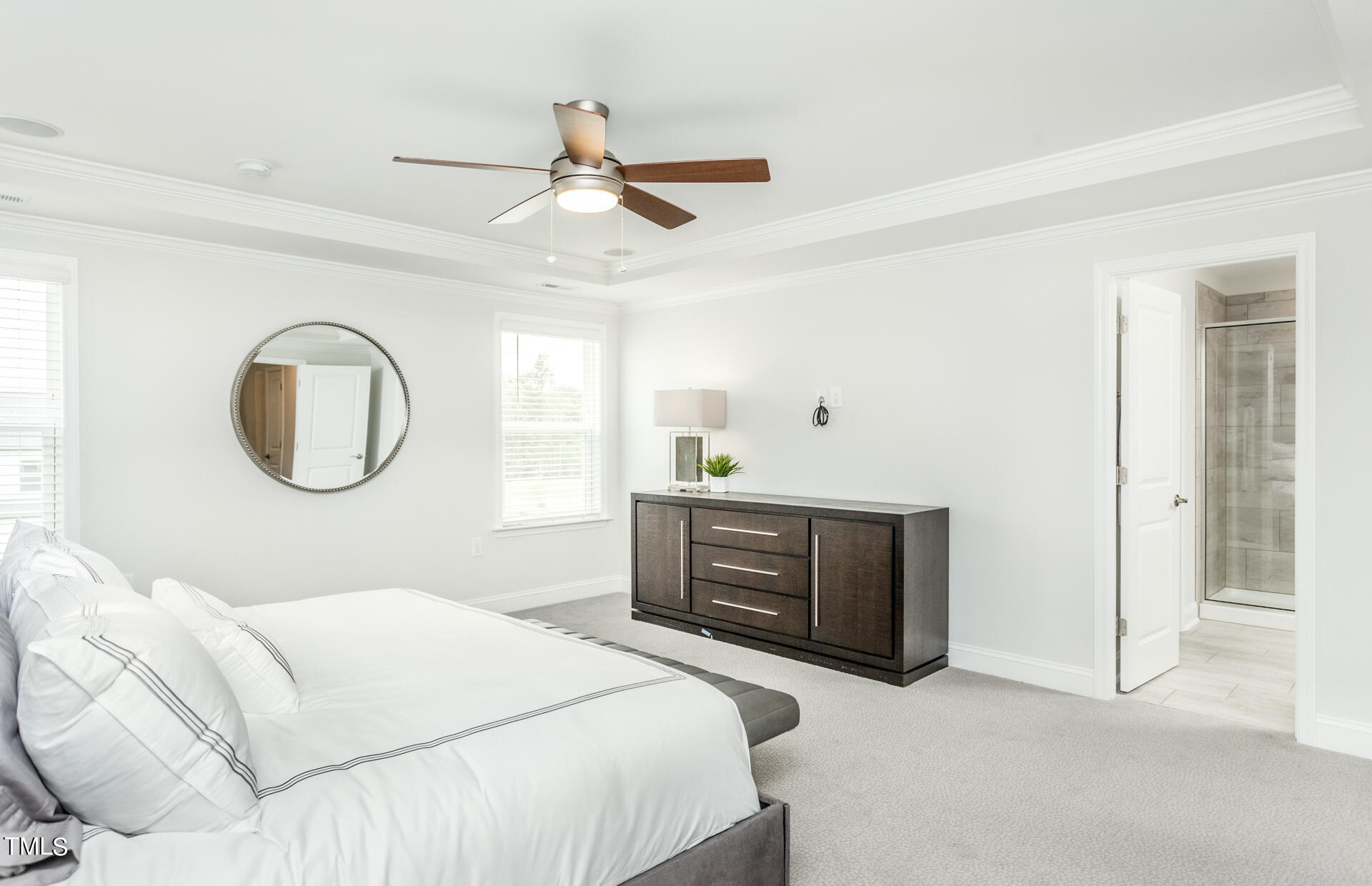 528 Fosterton Cottage Way Raleigh, NC 27603 - Photo 12 of 26 a bedroom with a bed and a dresser