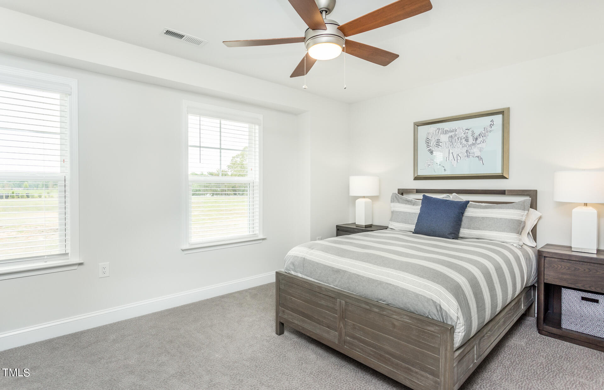 528 Fosterton Cottage Way Raleigh, NC 27603 - Photo 18 of 26 a bedroom with bed and window