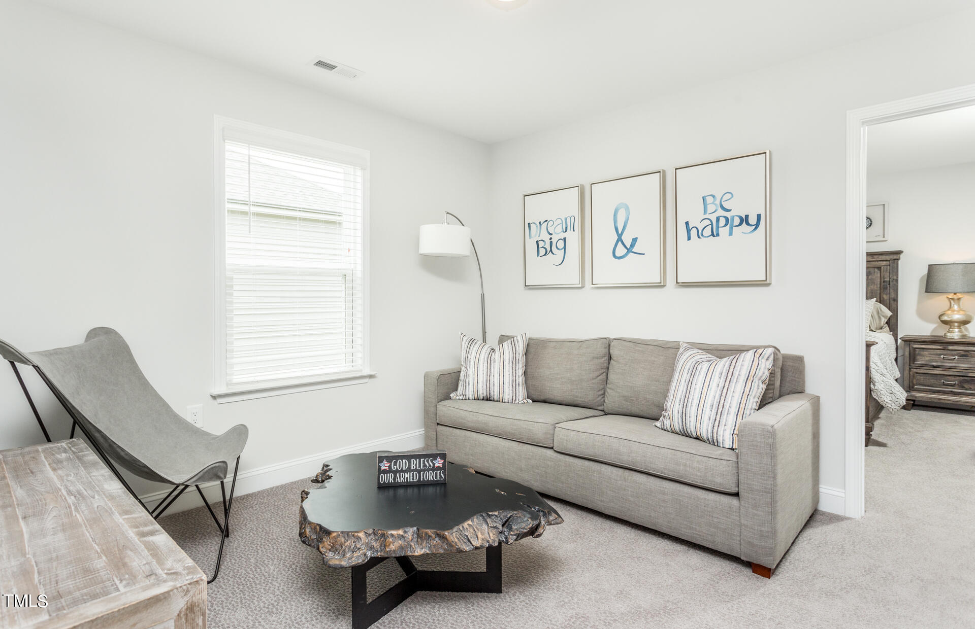 528 Fosterton Cottage Way Raleigh, NC 27603 - Photo 21 of 26 a living room with furniture and a window