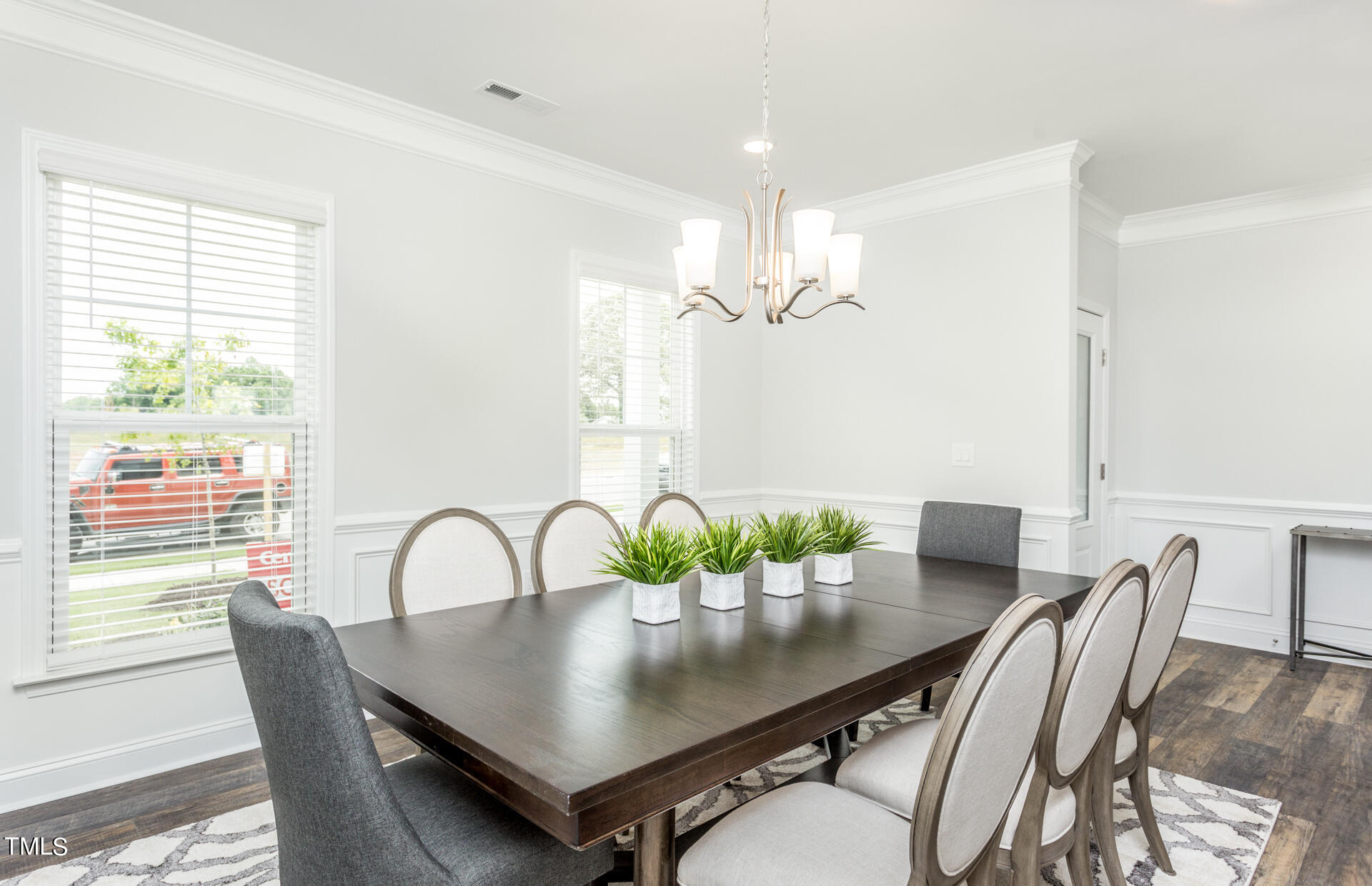 528 Fosterton Cottage Way Raleigh, NC 27603 - Photo 22 of 26 a view of a dining room with furniture window and outside view