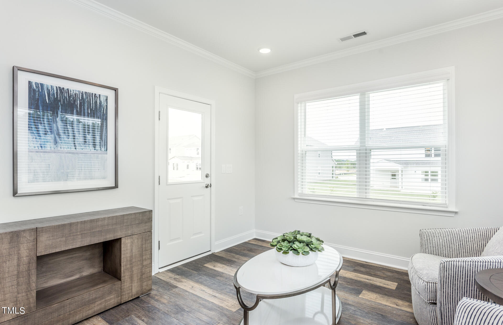 528 Fosterton Cottage Way Raleigh, NC 27603 - Photo 23 of 26 a living room with furniture and a fireplace