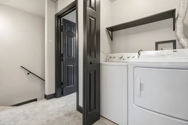 an empty room with a ceiling fan and a window