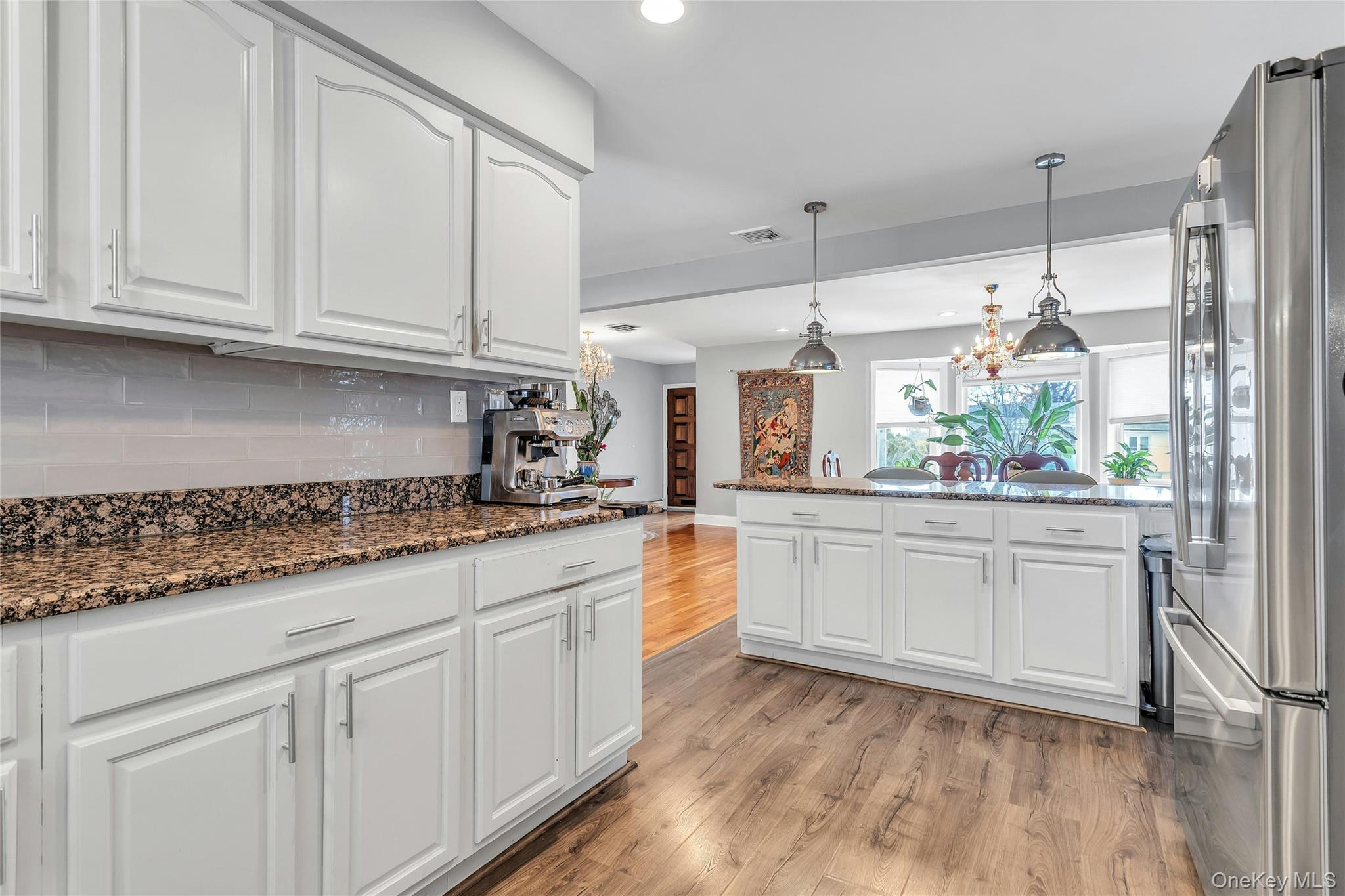 170 Old Courthouse Road Manhasset Hills, NY 11040 - Photo 11 of 35 View facing out of kitchen into the Dining room