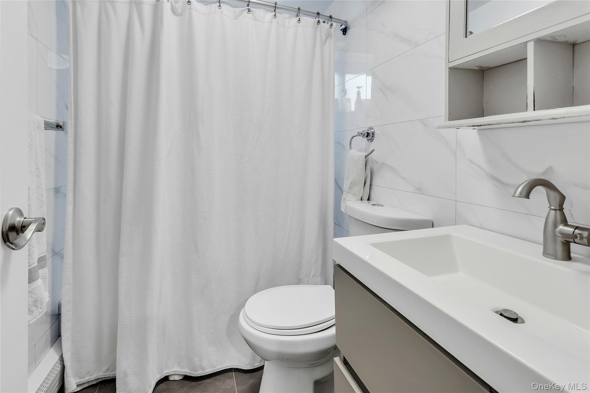 170 Old Courthouse Road Manhasset Hills, NY 11040 - Photo 28 of 35 Lower Level updated full bath