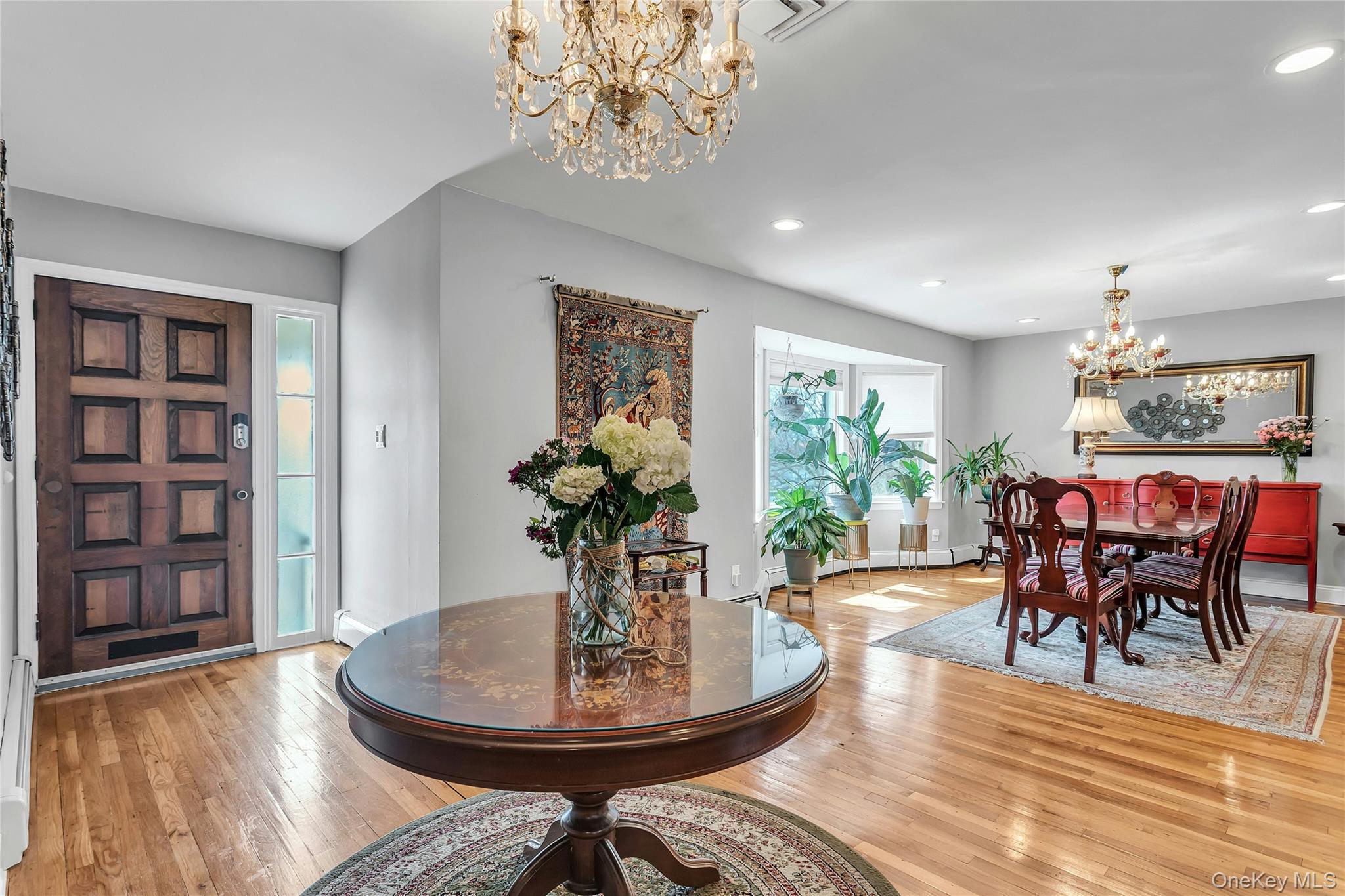 170 Old Courthouse Road Manhasset Hills, NY 11040 - Photo 4 of 35 Center Hall view looking in to the dining room and front of home, Great natural lighting