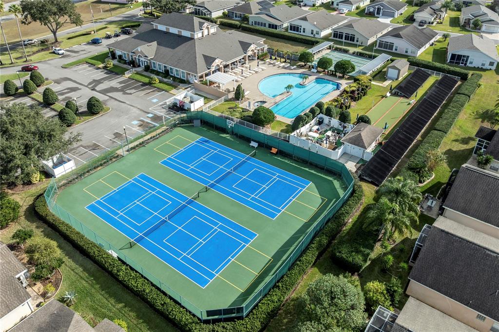508 Ridge View Drive Davenport, FL 33837 - Photo 16 of 22 an aerial view of a tennis ground with lots of trees