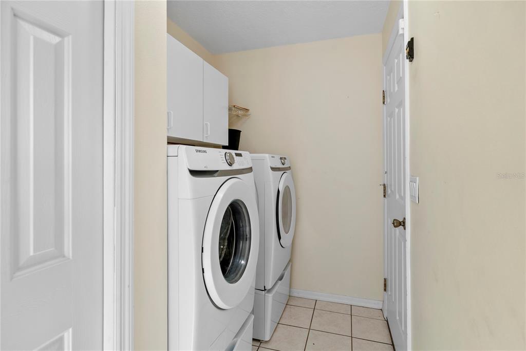 508 Ridge View Drive Davenport, FL 33837 - Photo 7 of 22 a utility room with dryer and washer