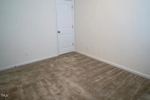 an empty room with an entryway
