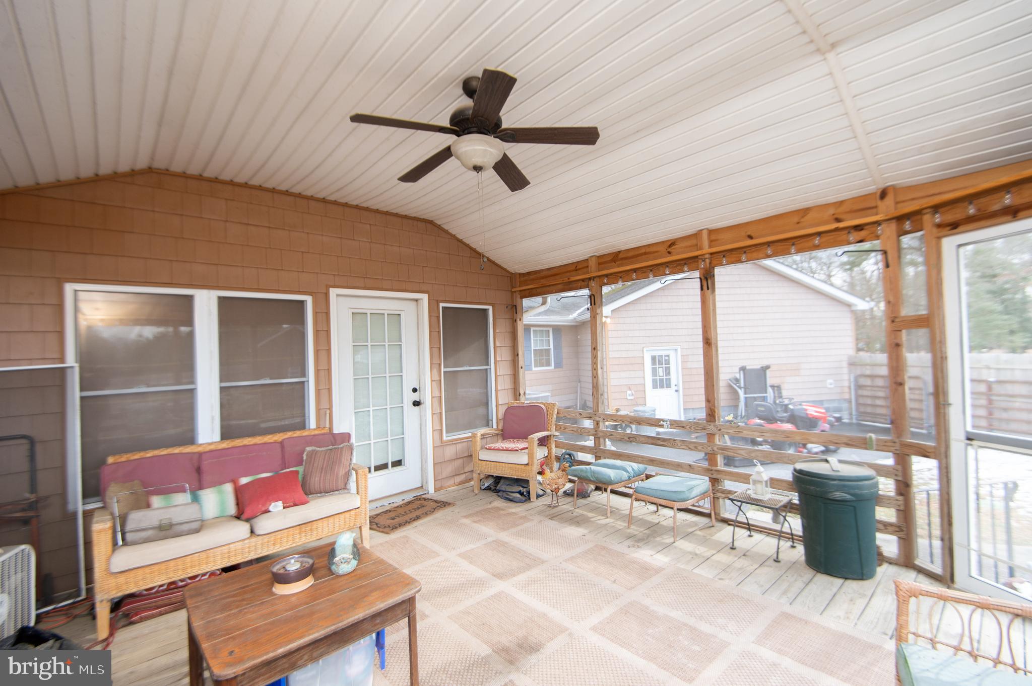 6132 Palmer Mill Road Hurlock, MD 21643 - Photo 27 of 37 a living room with furniture and a window