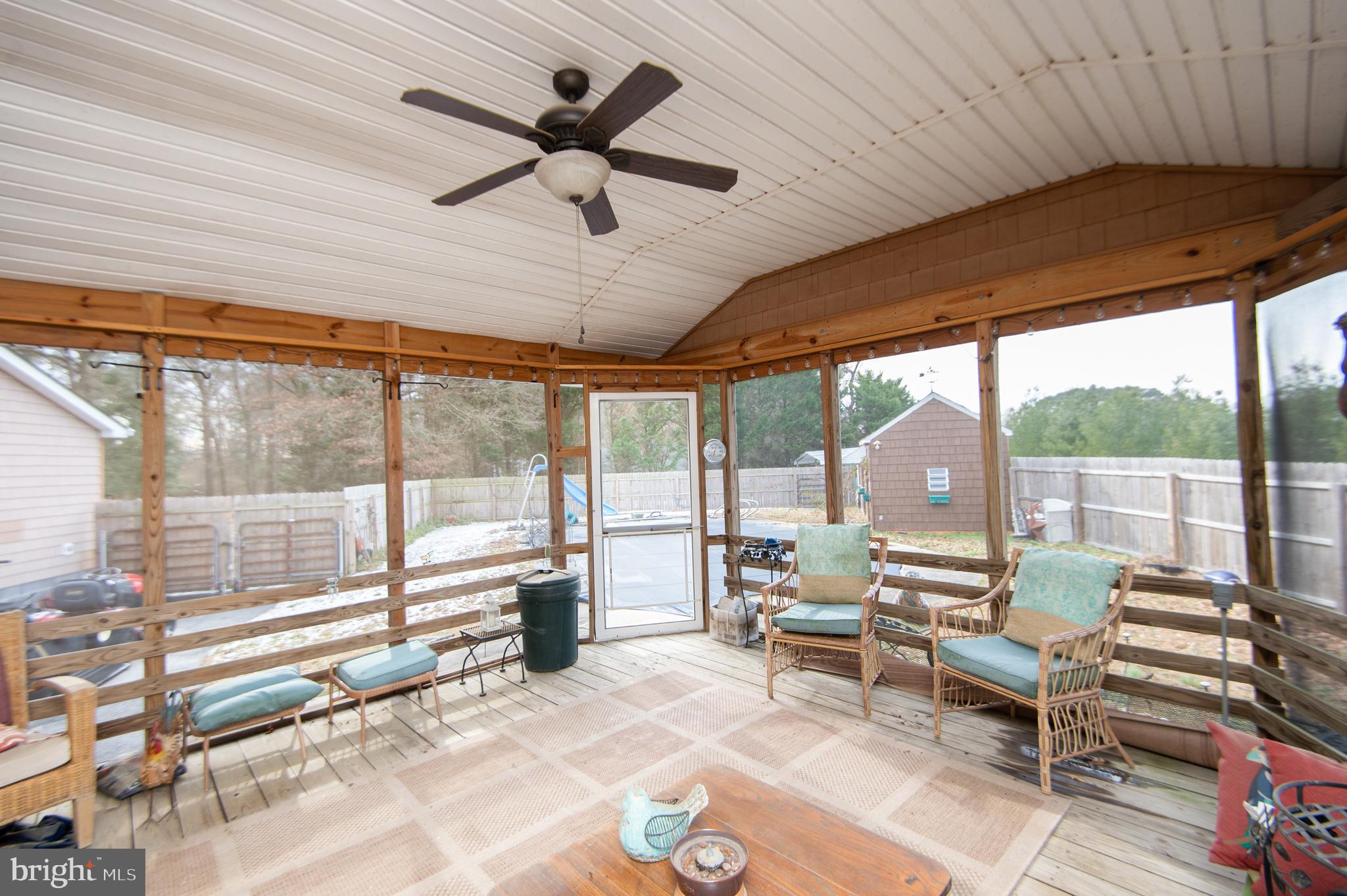 6132 Palmer Mill Road Hurlock, MD 21643 - Photo 28 of 37 a living room with furniture and a large window