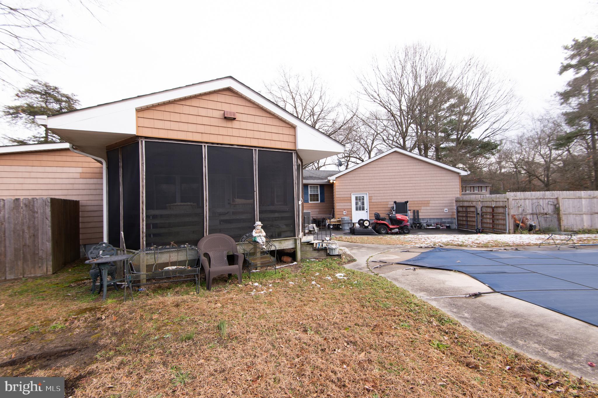 6132 Palmer Mill Road Hurlock, MD 21643 - Photo 29 of 37 a front view of house with outdoor seating area