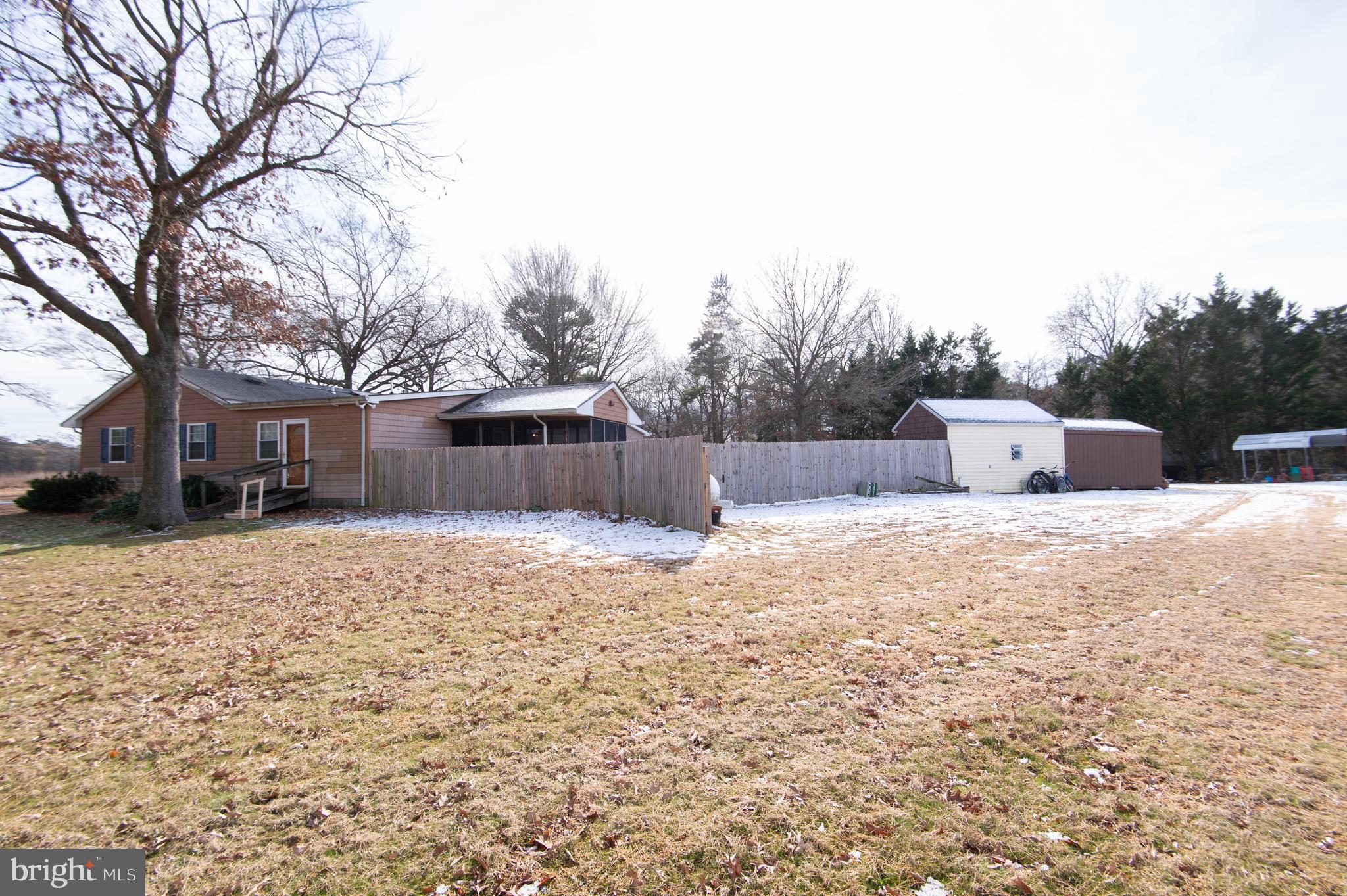 6132 Palmer Mill Road Hurlock, MD 21643 - Photo 32 of 37 a street view covered with snow